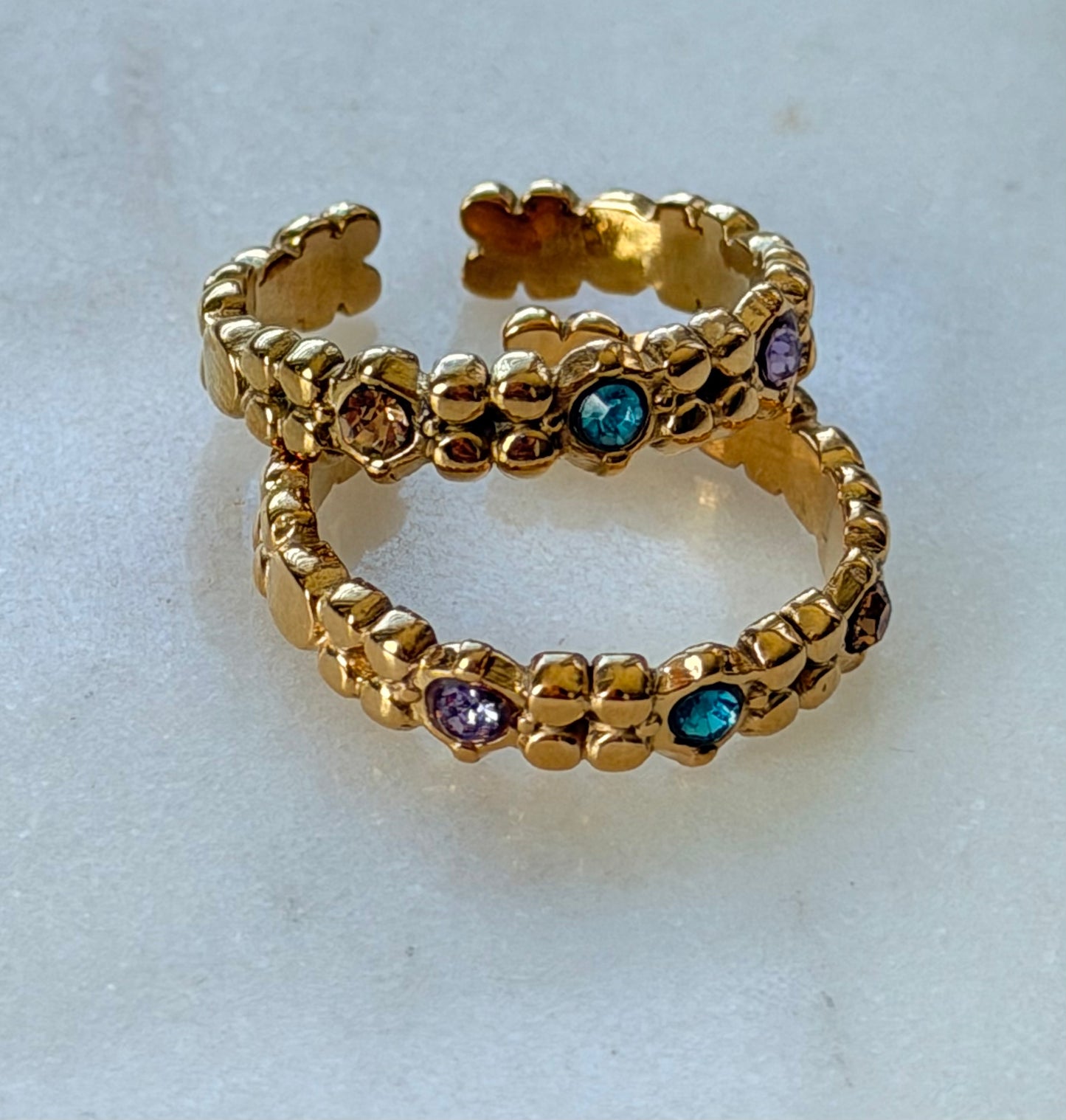 Iris Ring – 18K Gold PVD Open Stainless Steel Ring with Round Crystals