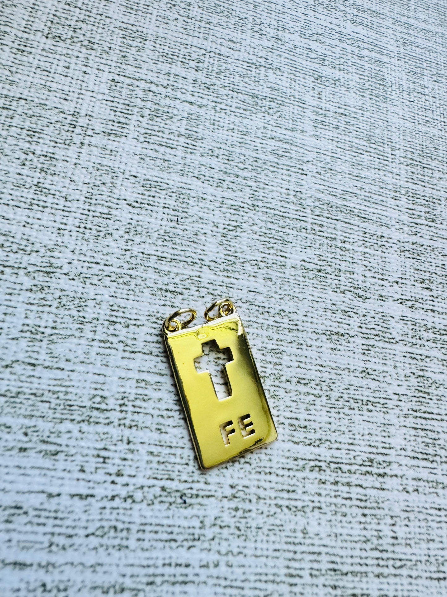 Fe Charm