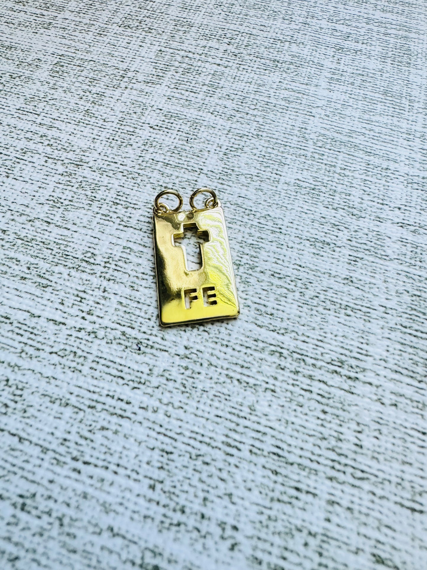 Fe Charm